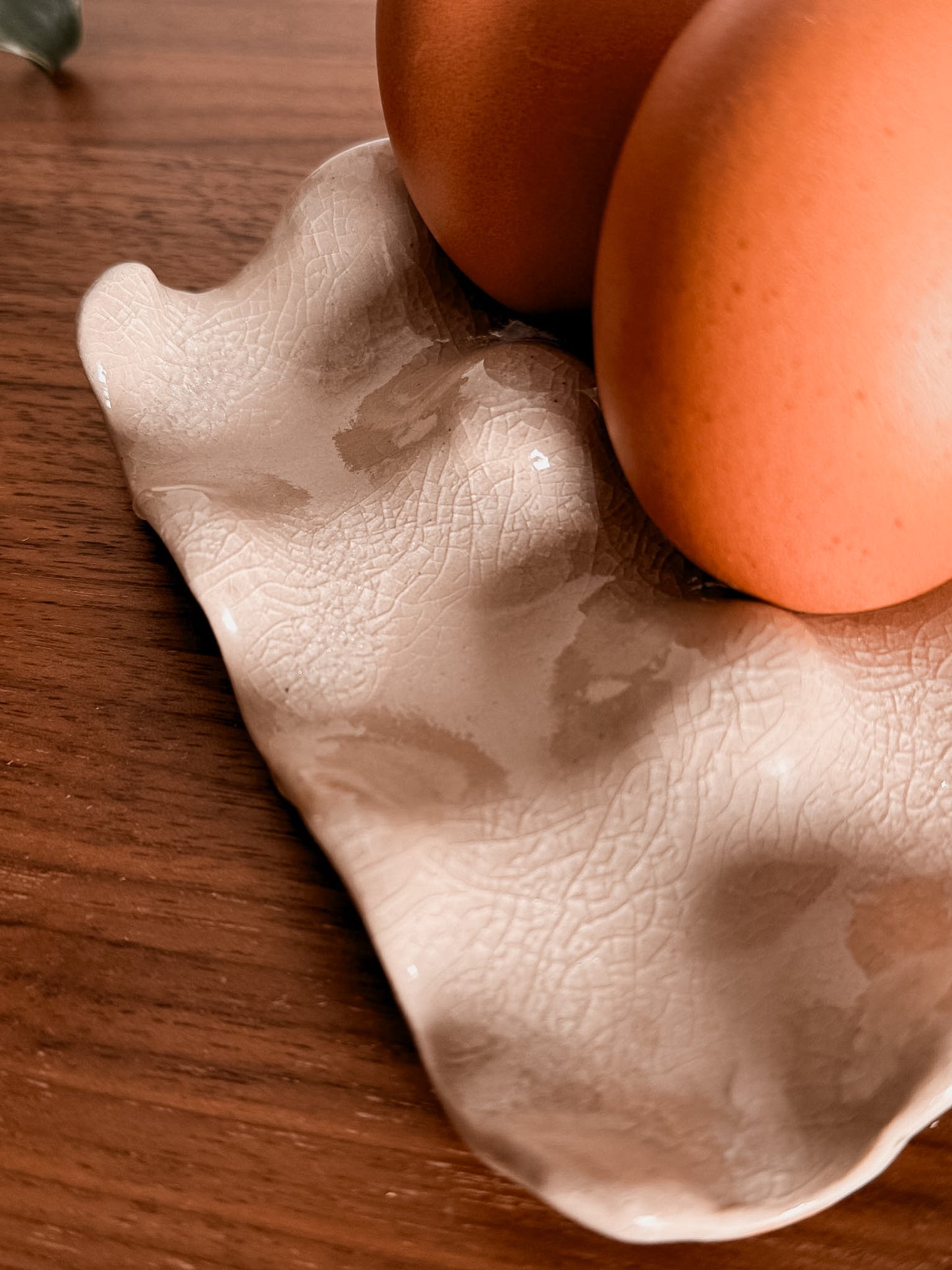 Le porte-oeufs beige