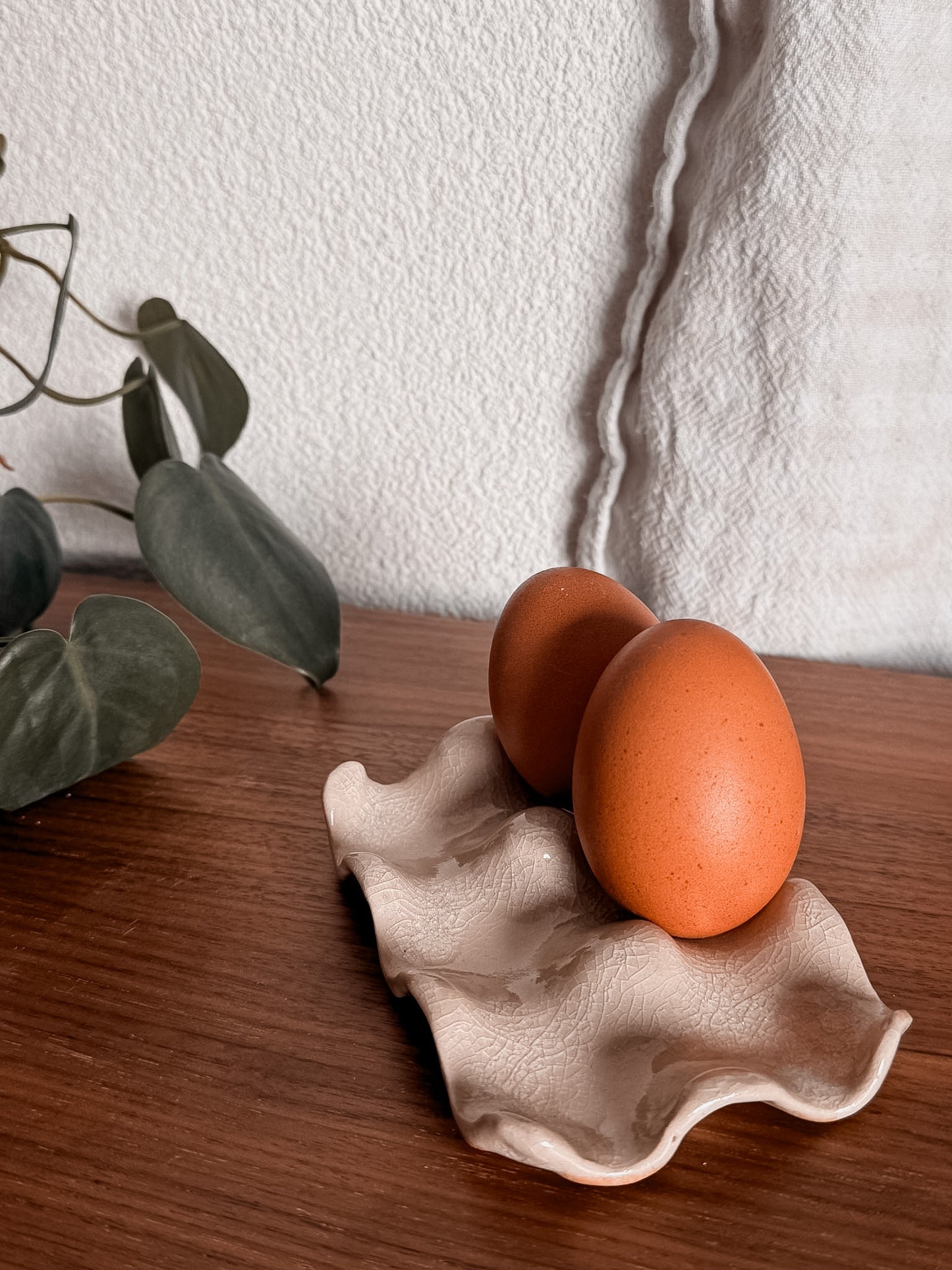 Le porte-oeufs beige